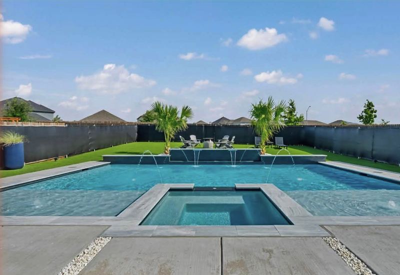 Rectangular pool with flush spa and bubblers